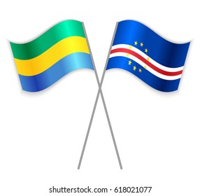 Gabonese and Cabo Verdean crossed flags. Gabon combined with Cabo Verde isolated on white. Language learning, international business or travel concept.