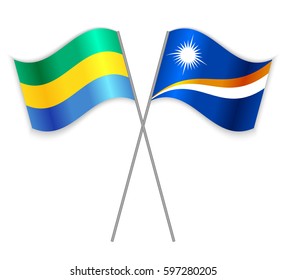 Gabonese and Marshallese crossed flags. Gabon combined with Marshall Islands isolated on white. Language learning, international business or travel concept.