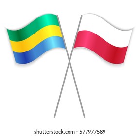 Gabonese and Polish crossed flags. Gabon combined with Poland isolated on white. Language learning, international business or travel concept.