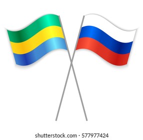 Gabonese and Russian crossed flags. Gabon combined with Russia isolated on white. Language learning, international business or travel concept.
