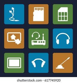 Gadget icons set. set of 9 gadget filled icons such as tablet, arm lever, earphones, home on tablet, memory card