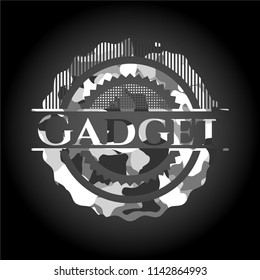Gadget on grey camouflage pattern