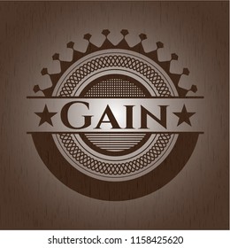 Gain badge with wood background