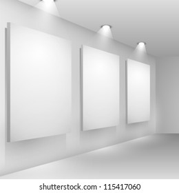 Gallery interior empty frames on wall with reflectors