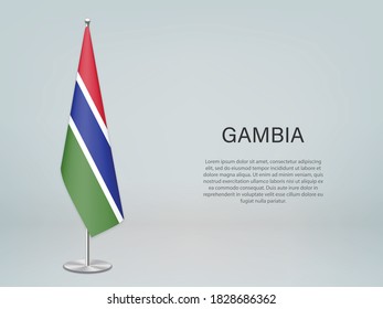 Gambia hanging flag on stand. Template for politic conference banner