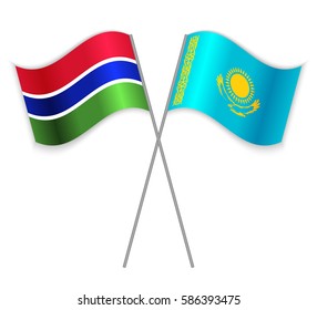 Gambian and Kazakh crossed flags. Gambia combined with Kazakhstan isolated on white. Language learning, international business or travel concept.