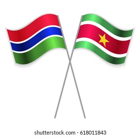 Gambian and Surinamese crossed flags. Gambia combined with Suriname isolated on white. Language learning, international business or travel concept.