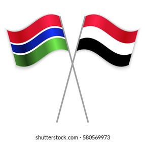 Gambian and Yemeni crossed flags. Gambia combined with Yemen isolated on white. Language learning, international business or travel concept.