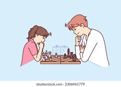 Game of chess between man and teenage girl during training of professional grandmaster or preparation for sports tournament. Father and daughter play chess to develop child strategic thinking