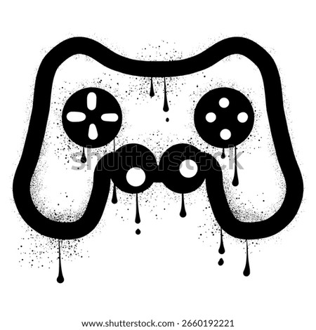 Game controller graffiti with black spray paint splatters and drips