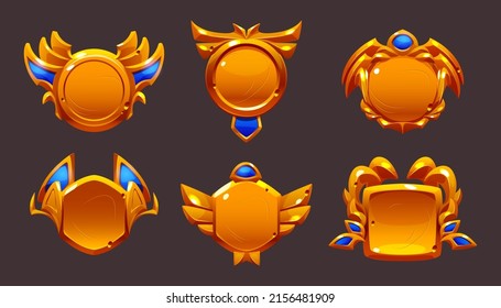 Game gold award badges with decorative frames.Vector cartoon icons set of glossy emblems with fantasy borders and blue elements. Achievement label for win in game