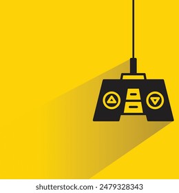 game joystick icon with drop shadow on yellow background