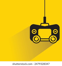 game joystick icon with drop shadow on yellow background