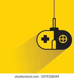 game joystick icon with drop shadow on yellow background