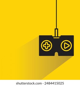 game joystick icon with drop shadow on yellow background