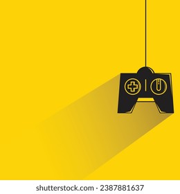 game joystick icon with shadow on yellow background