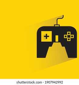 joystick de juegos con sombra sobre fondo amarillo