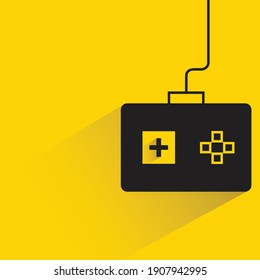 game joystick with shadow on yellow background