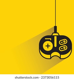 joystick de juegos con sombra sobre fondo amarillo