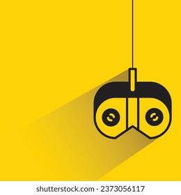 game joystick with shadow on yellow background