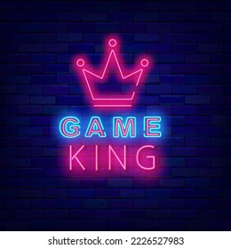Game king neon signboard. Pink crown icon. Virtual reality playing. Game design. Luminous label on brick wall. Shiny banner. Vector stock illustration