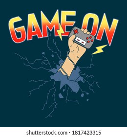 GAME ON TYPOGRAPHY, VECTOR ILLUSTRATION OF A HAND HOLDING A GAME CONTROLLER, SLOGAN PRINT VECTOR