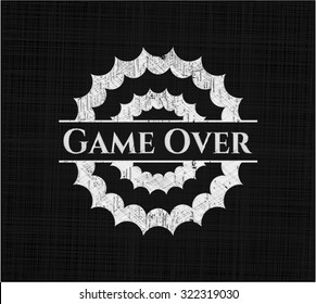 Game Over chalk emblem written on a blackboard