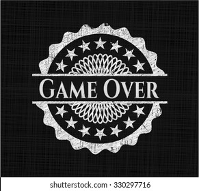 Game Over chalk emblem written on a blackboard