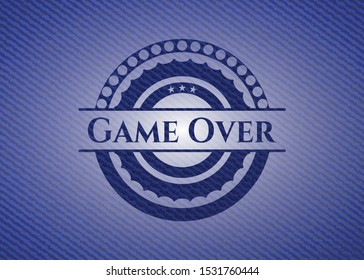 Game Over emblem with denim texture. Vector Illustration. Detailed.