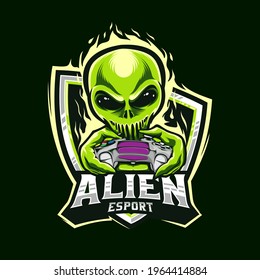 Game player alien e-sport logo design. Alien holding analog game controller. Mascot design