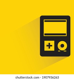 gamepad with drop shadow on yellow background