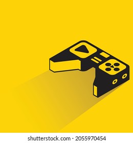 gamepad with shadow on yellow background