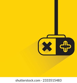 gamepad with shadow on yellow background