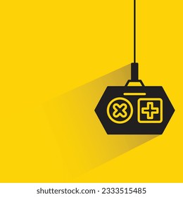 gamepad with shadow on yellow background