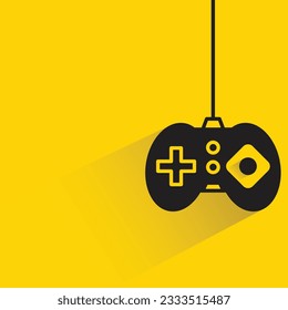 gamepad con sombra sobre fondo amarillo
