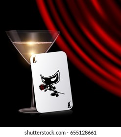 games card, glass and red drape