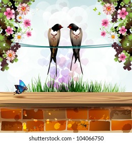 Garden with brick wall and two swallows