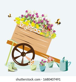 garden cart with flowers and garden tools