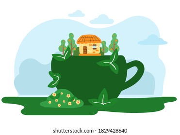 Garden figure of a cup, shrub sculpture green color with house, trees and bushes with flowers above. Artistic pruning of the bush in the shape of a coffee cup with a handle. Park design plant element