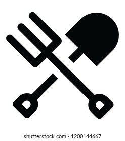 
garden fork and garden rake as gardening tools
