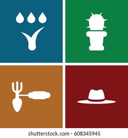 Garden icons set. set of 4 garden filled icons such as gardening tool, hat, cactus