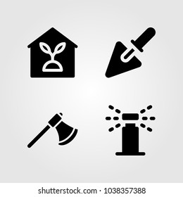 Garden icons set. Vector illustration trowel, sprinkle, axe and indoor plants