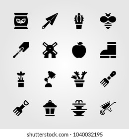 Garden icons set. Vector illustration trowel, plant, fork and desk lamp