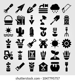 Garden icons set. Vector illustration plant, rake, can and garden fork
