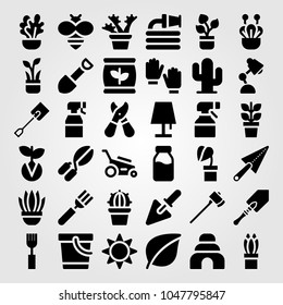 Garden icons set. Vector illustration fork, pail, desk lamp and plant