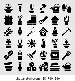 Garden icons set. Vector illustration hammer, garden fork, bird house and boots