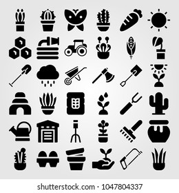Garden icons set. Vector illustration watering can, rake, tractor and wheat