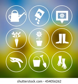 Garden Tools Icons on Blurred Background