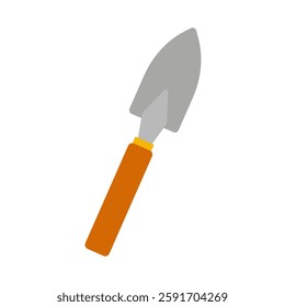 Garden trowel resting on a white surface ready for planting in a vibrant home garden
