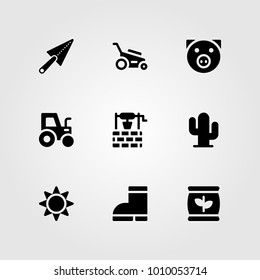 Garden vector icon set. trowel, tractor, boots and sun